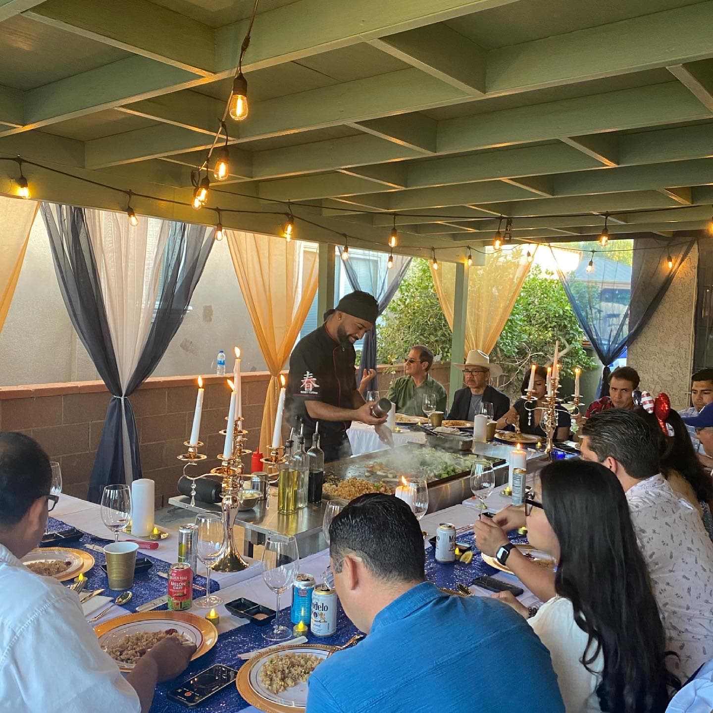 Private party hibachi event with guests enjoying the show